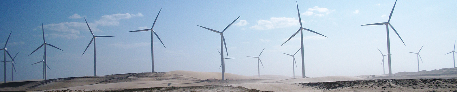 Classic Suzlon wind turbines operating in a desert wind farm